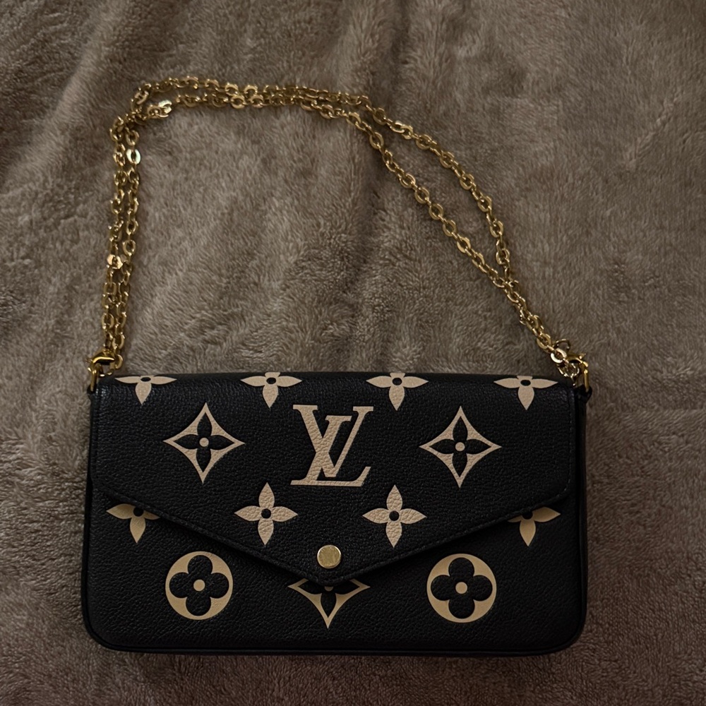 Louis Vuitton Black and Gold Clutch